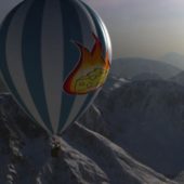 Hot Air Balloon Flying On Mountain